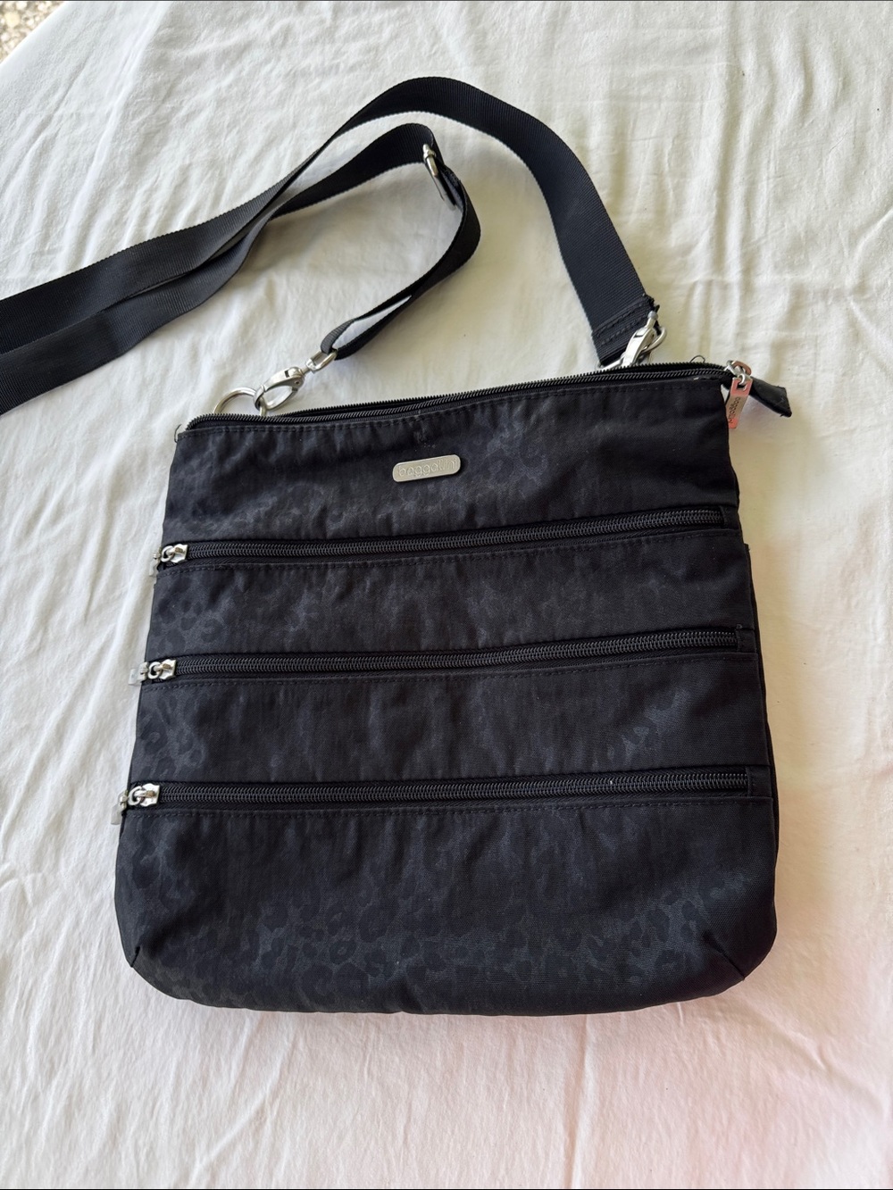 Baggallini Black Crossbody Organizer with Subtle Pattern. Size: 11”x11”